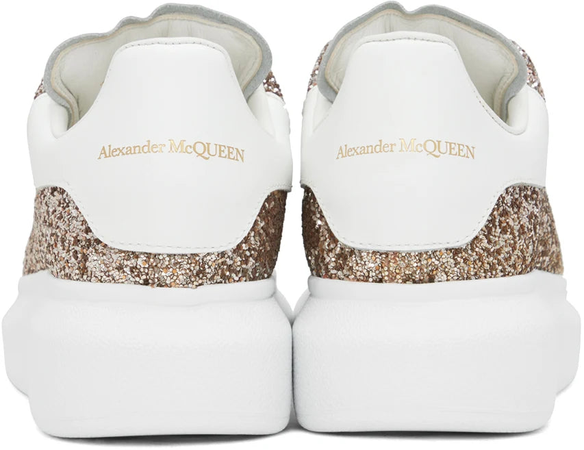 ALEXANDER MCQUEEN Sneakers oversize con glitter in oro rosa