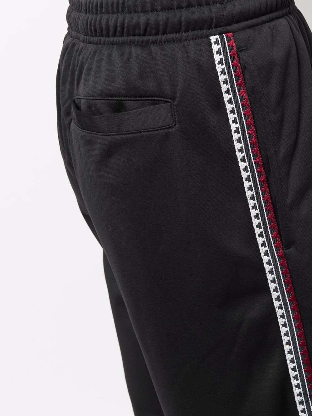 Marcelo Burlon County of Milan Pantaloni sportivi con banda laterale