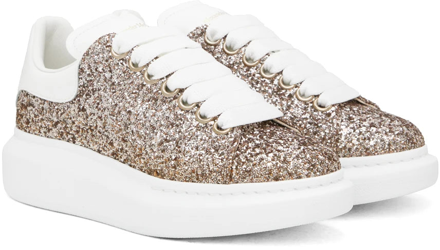 ALEXANDER MCQUEEN Sneakers oversize con glitter in oro rosa
